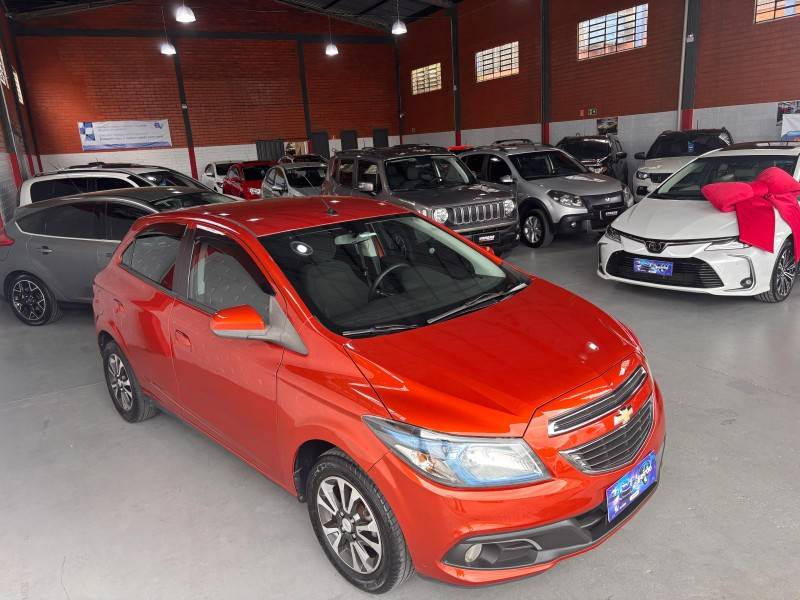 CHEVROLET - ONIX - 2013/2013 - Laranja - R$ 46.000,00