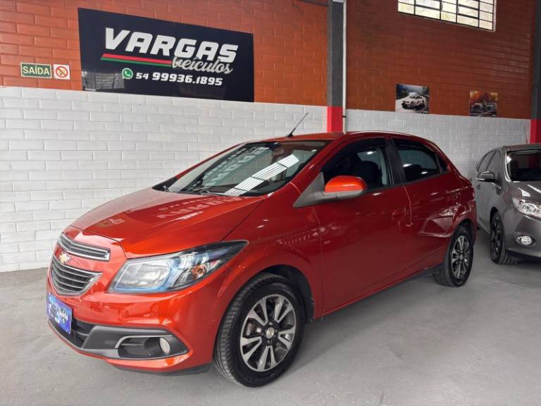 CHEVROLET - ONIX - 2013/2013 - Laranja - R$ 46.000,00